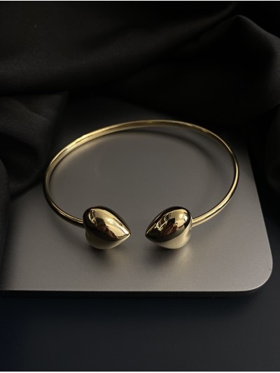 Браслет манжет Сердечки золотого кольору 34385