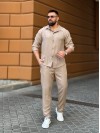 Чоловічий брючний костюм бежевого кольору 33081