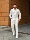 Чоловічий брючний костюм молочного кольору 33080