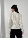 Обтягуючий жіночий светр молочного кольору 31610