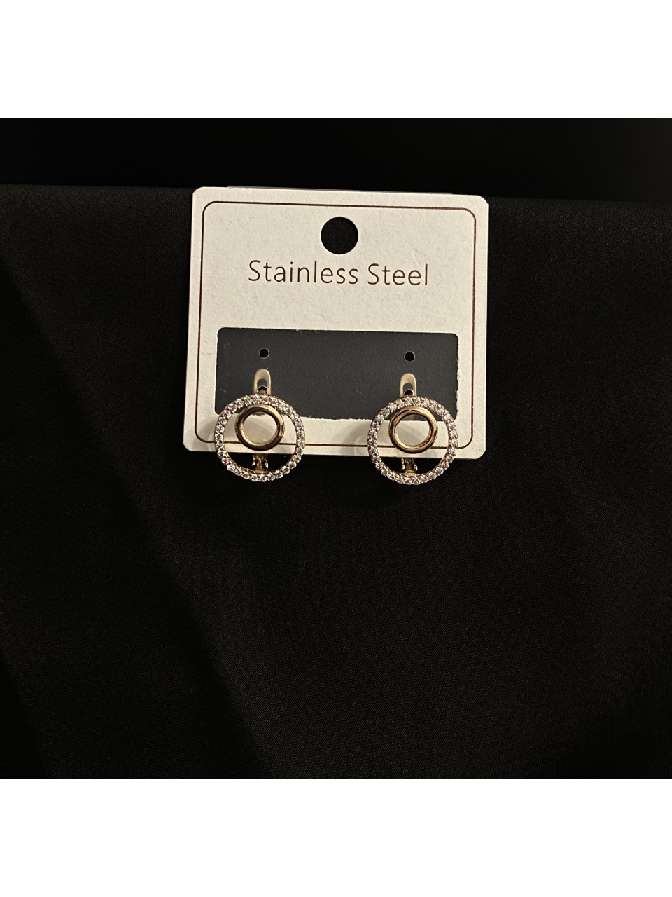 Сережки круглі з камінцями золотого кольору англійський замок 33354