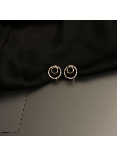 Сережки круглі з камінцями золотого кольору англійський замок 33354