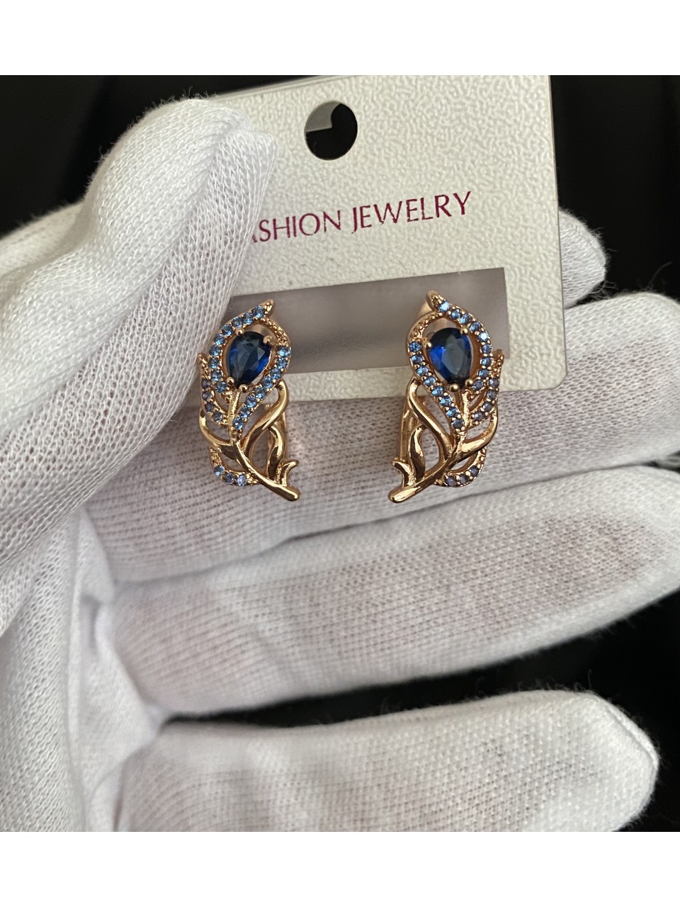 Сережки із синім камінням золотого кольору англійський замок 32780