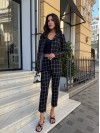 Стильний жіночий костюм в клiтину чорного кольору 34082