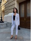 Стильний жіночий костюм в клiтину молочного кольору 34081