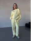 Теплий жiночий костюм жовтого кольору 35624