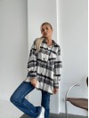 Жіноча байкова сорочка в клітинку чорного кольору 29293