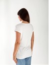 Жіноча футболка з блискітками та кишенею білого кольору 33239