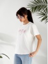 Жіноча футболка з малюнком молочного кольору 32553