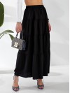 Жіноча льняна спідниця міді з воланами чорного кольору 33213