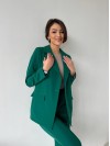 Жіночий класичний костюм зеленого кольору 32112
