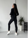 Жіночий костюм чорного кольору 26301