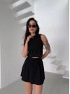 Жіночий легкий костюм 2-ка зі спідницею чорного кольору 31652