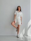 Жіночий літній костюм молочного кольору 32968