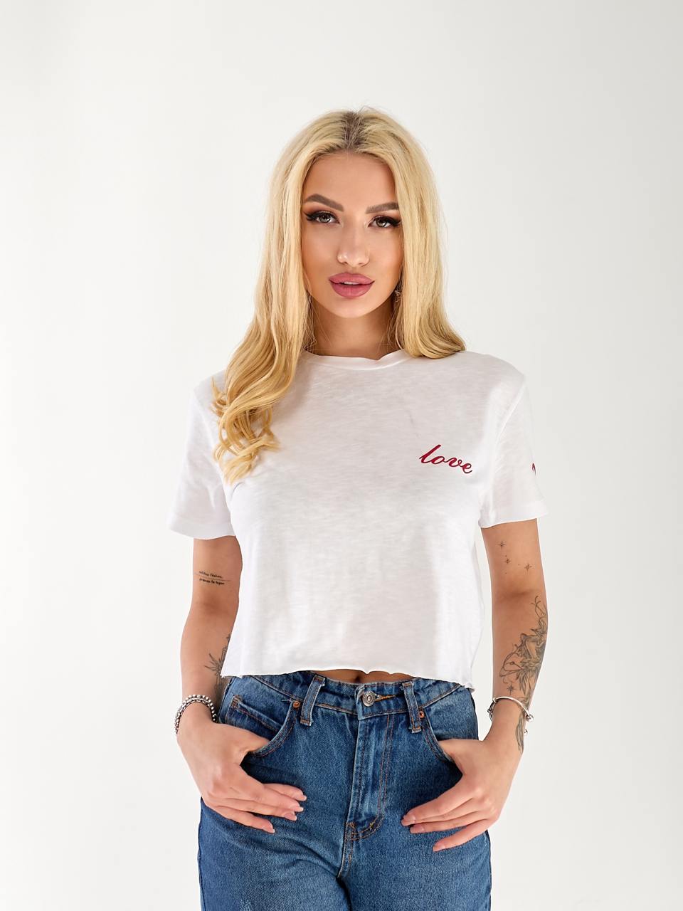 Жіночий топ Love молочного кольору 33225