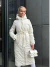 Жіноче зимове пальто-пуховик молочного кольору 35217