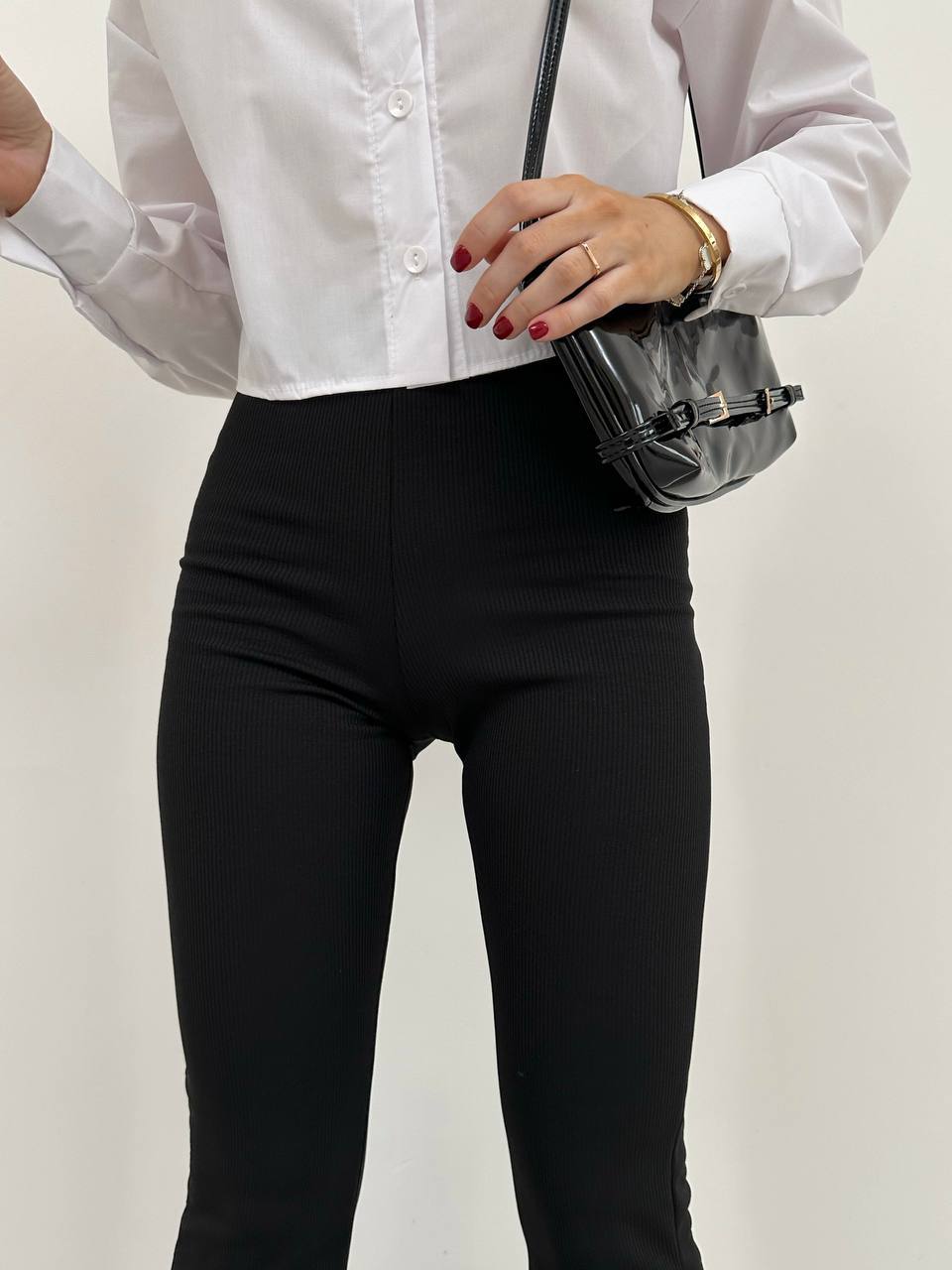 Жіночі лосини кльош на флiсi чорного кольору 35376