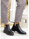Жіночі шкіряні короткі черевики на байці чорного кольору 34897