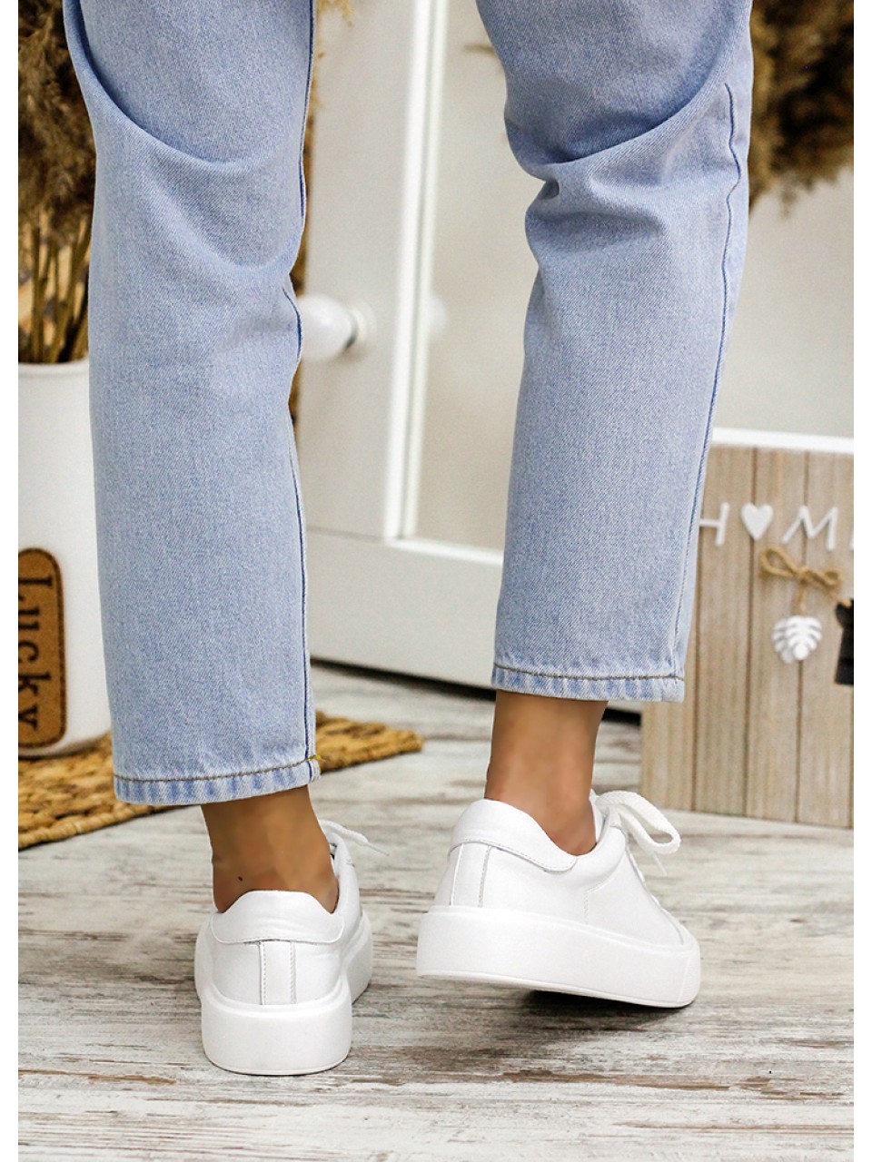 Жіночі шкіряні кеди білого кольору 34856