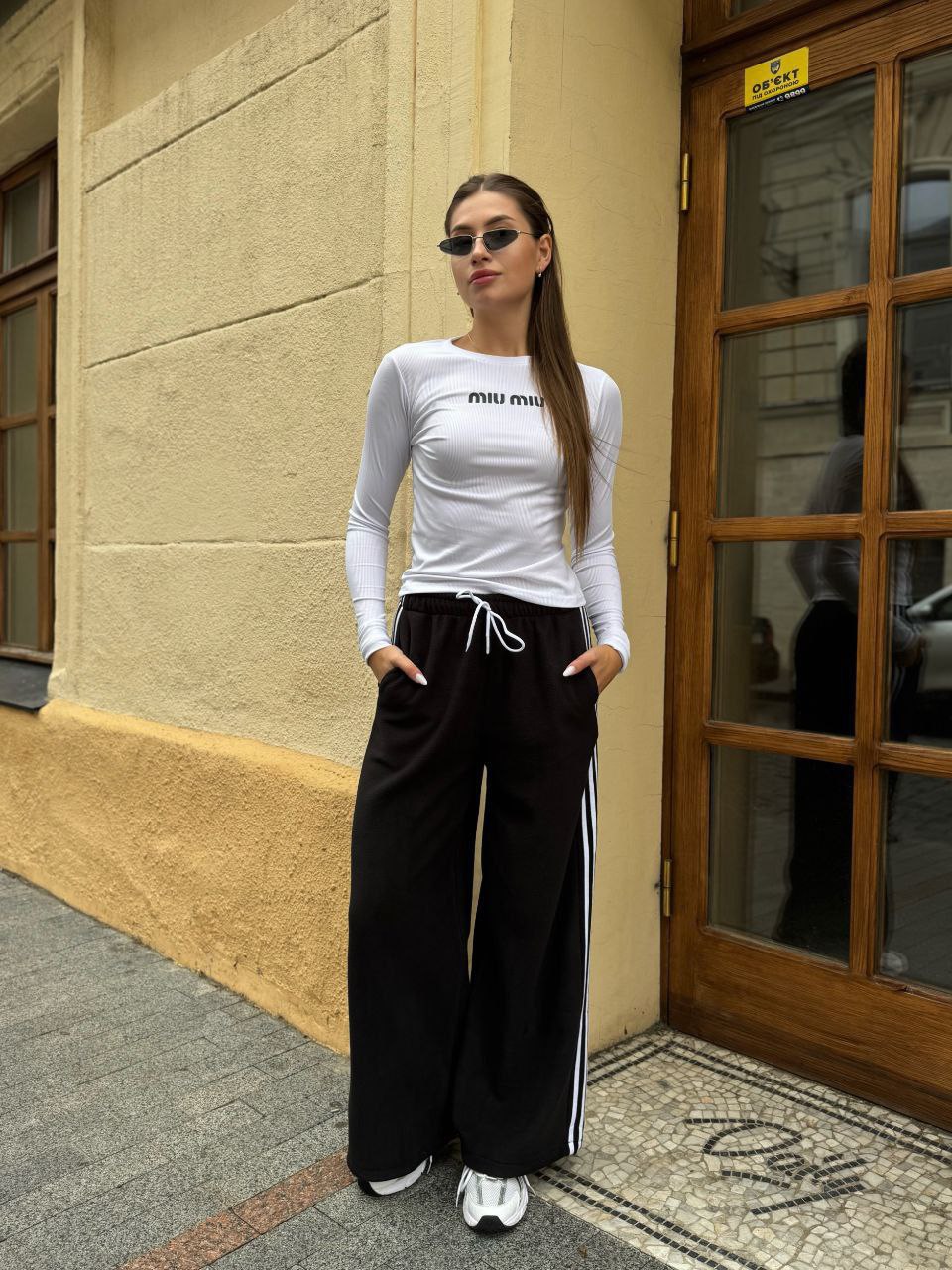 Жiночi теплi штани з лампасами чорного кольору 35359