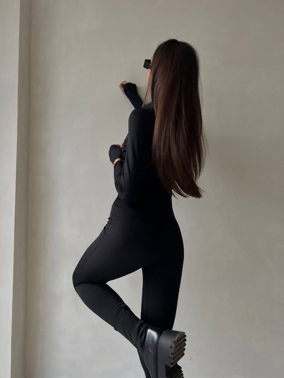 Жіночий еластичний комбінезон на флiсi чорного кольору 34475