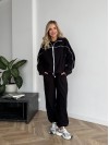 Жіночий флiсовий костюм на змiйцi чорного кольору 34945