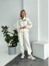 Жіночий флiсовий костюм вiльного крою молочного кольору 34749