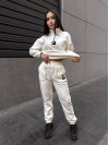 Жіночий костюм флісовий молочного кольору 35077