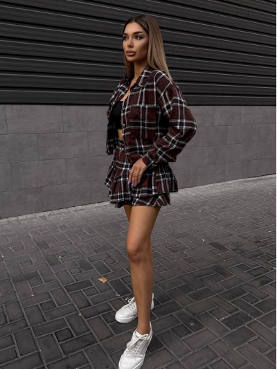 Жіночий костюм зі спідницею в клітку коричневого кольору 34044