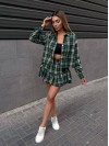 Жіночий костюм зі спідницею в клітку зеленого кольору 34046