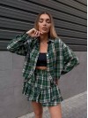 Жіночий костюм зі спідницею в клітку зеленого кольору 34046