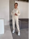 Жіночий спортивний костюм на флісi з капюшоном молочного кольору 35770