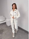 Жiночий теплий комбінезон iз флiса молочного кольору 35894