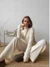 Жіночий в'язаний костюм молочного кольору 29953