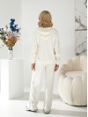 Жіночий в'язаний костюм на змiйцi молочного кольору 34519